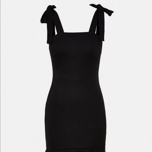 Black ruffle hem tie shoulder mini dress